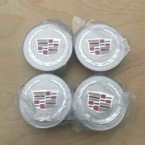 CADILLAC HUB CAPS SILVER